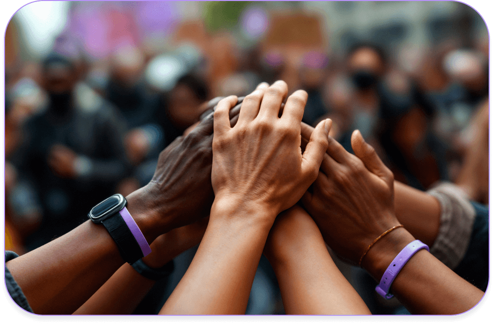 Hands joined together in a crowd