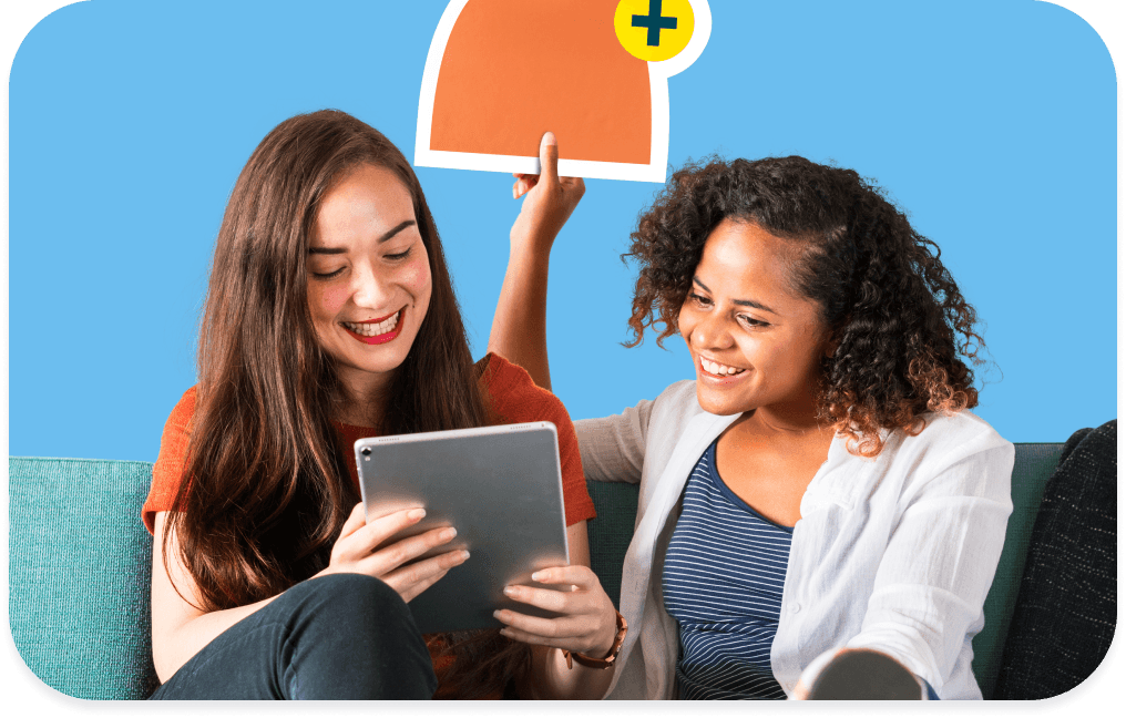 Two friends looking at a tablet together